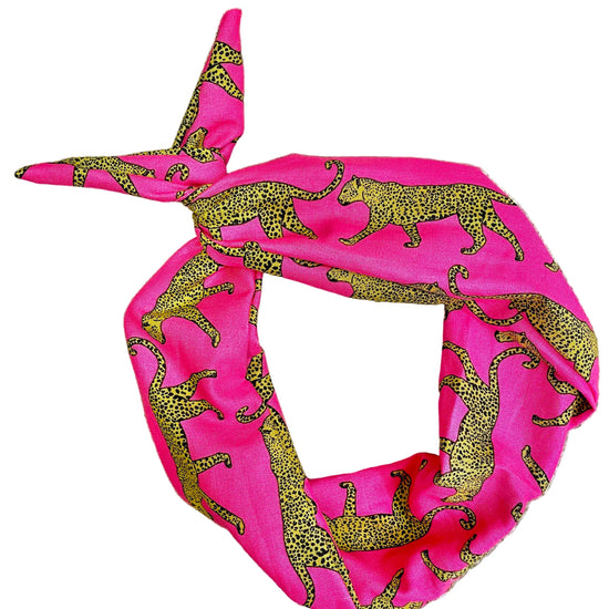 Amanda Bright Designs bright pink cotton headband with a yellow and black leopard print