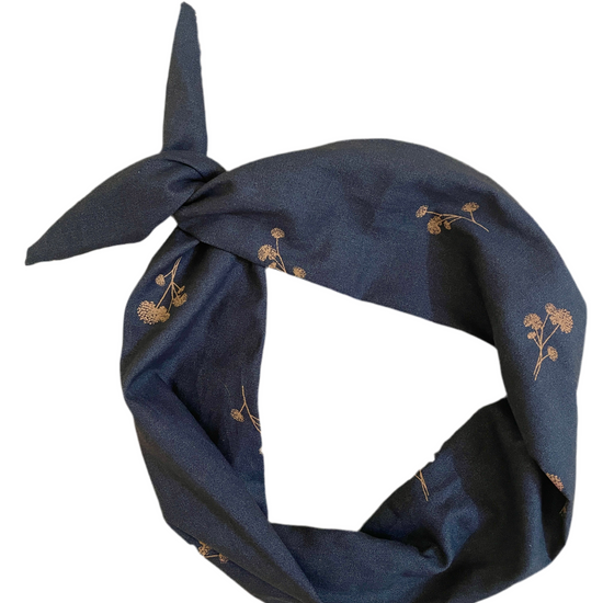 Amanda Bright Designs Navy blue headband with floral patterns on a white background