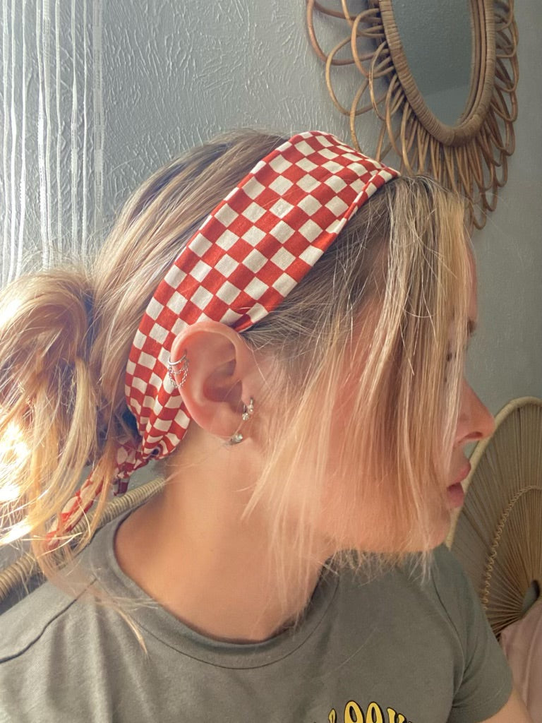 Amanda Bright Designs The Original Tie Headband Orange Check on model