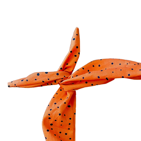 Amanda Bright Designs tie heaband in orange with black speckle polkadots