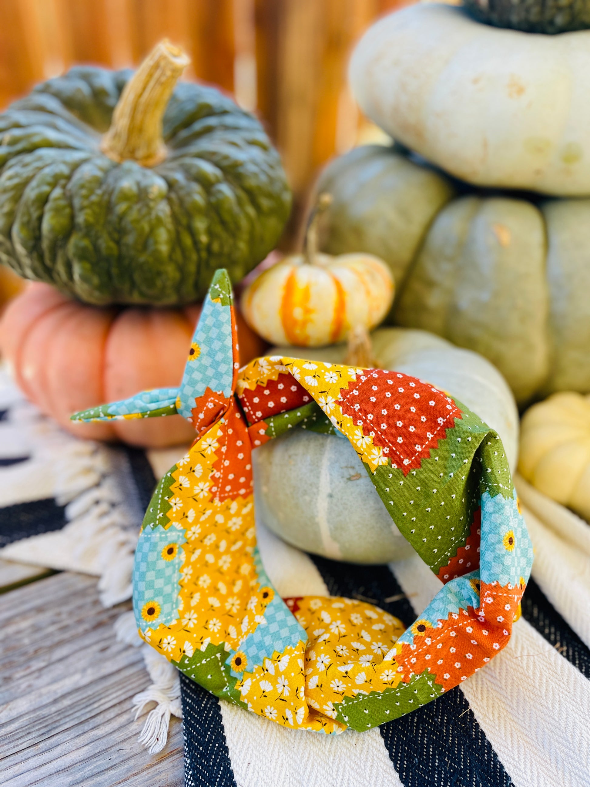 Amanda Bright Designs fall patchwork quilt headband with sunflowers teal green orange gold
