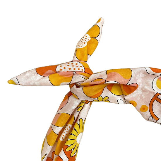 Amanda Bright Designs Original Tie Headband Peace Out Peace Symbols Flower Power Fabric for women  vintage-inspired print mixes peace signs, retro daisies, and funky florals in shades of burnt orange, golden yellow, cream, and warm brown