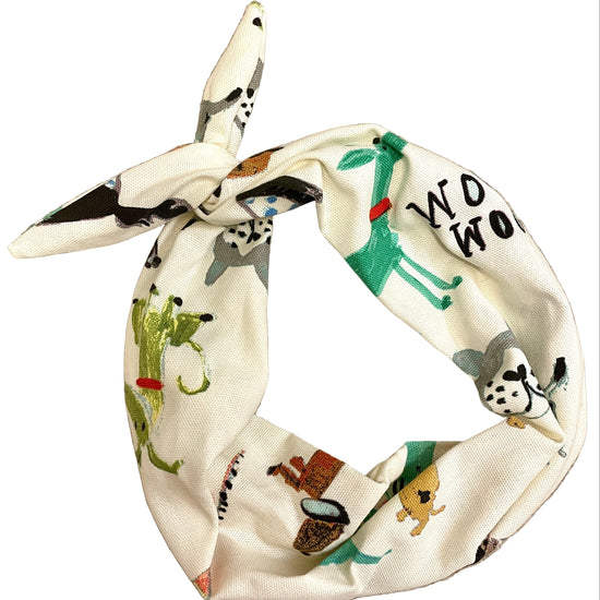 Amanda Bright Designs Sherbert Dogs White headband with colorful animal prints on a cream background headband for women pet lovers agility trainers