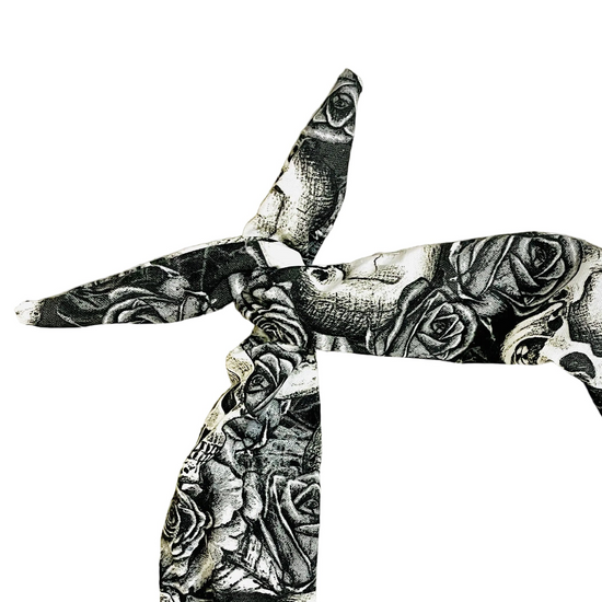 Amanda Bright Designs tie headband featuring skulls and roses tattoo style design in monotone black and cream