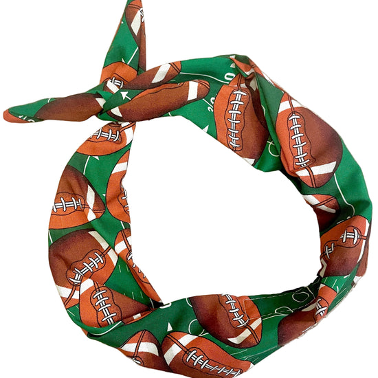 Amanda Bright Designs touchdown Brown Laced Footballs on Green astroturf background Original Tie Headband for college football NFL fans