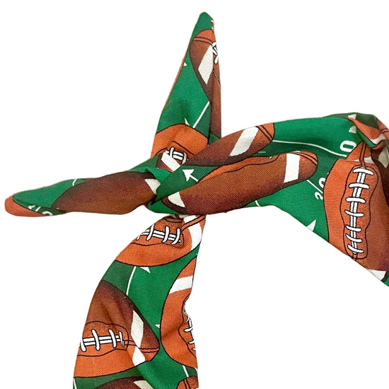 Amanda Bright Designs touchdown Brown Laced Footballs on Green astroturf background Original Tie Headband for college football NFL fans