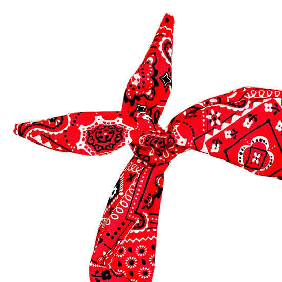 Amanda Bright Designs red bandana tie headband with a black and white paisley pattern, tied in a knot