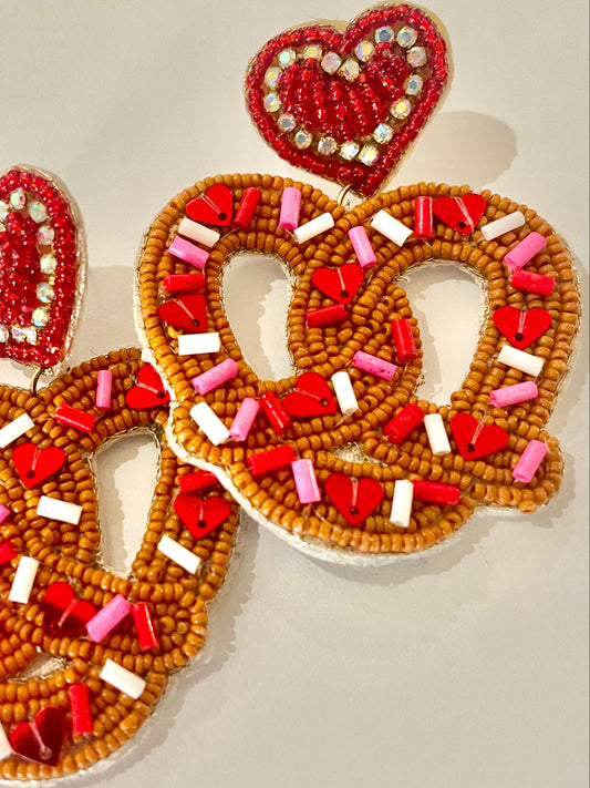 Amanda Bright Designs Heart-shaped pretzel earrings with red, white, and pink beads 