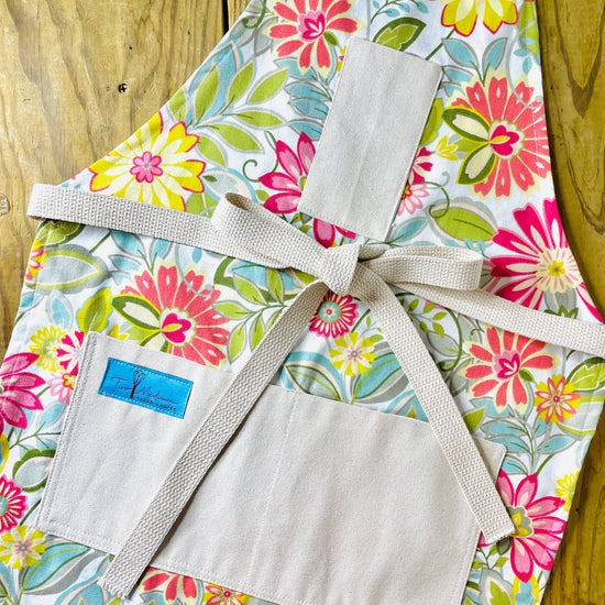 Two Medium Sized Ladies retro groovy 1960s flowers Charlotte peach orange raspberry soft green kitchen baking gardening cooking apron