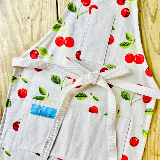 Two Medium Sized Ladies cherie vintage cherries 1950s retro pattern American kitchen baking cooking meal family time vintage apron style