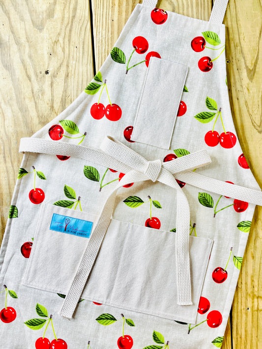 Two Medium Sized Ladies cherie vintage cherries 1950s retro pattern American kitchen baking cooking meal family time vintage apron style