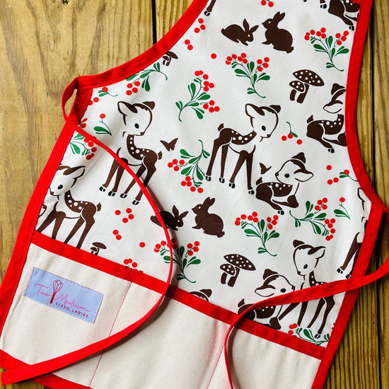 Amanda Bright Designs Children's Christmas Aprons Grinch Hello Kitty Nightmare Before Christmas Gingerbread Kitchen Baking Mommy and Me Peppermint Swirl Forest Fawn Rudolph