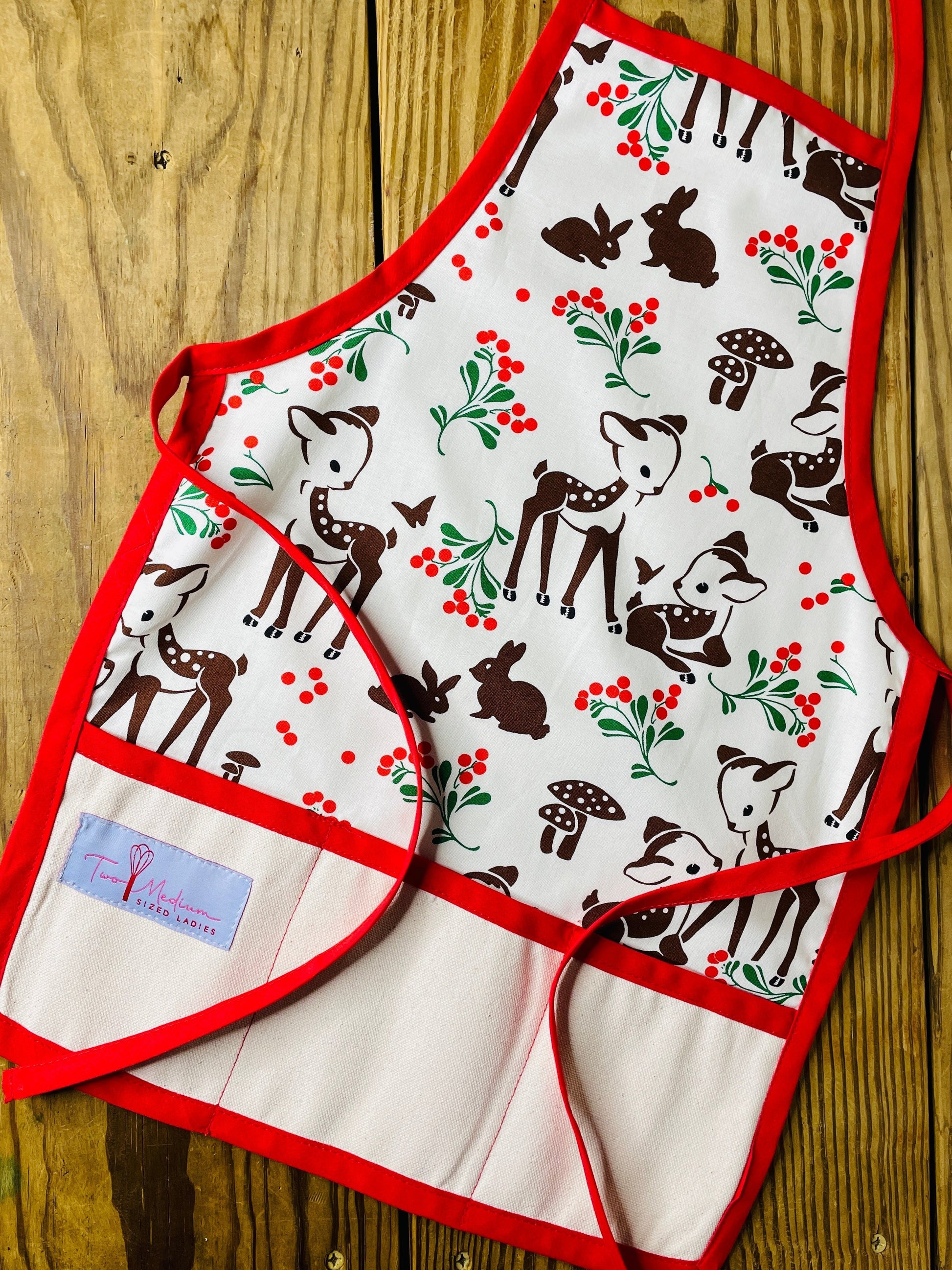 Amanda Bright Designs Children's Christmas Aprons Grinch Hello Kitty Nightmare Before Christmas Gingerbread Kitchen Baking Mommy and Me Peppermint Swirl Forest Fawn Rudolph