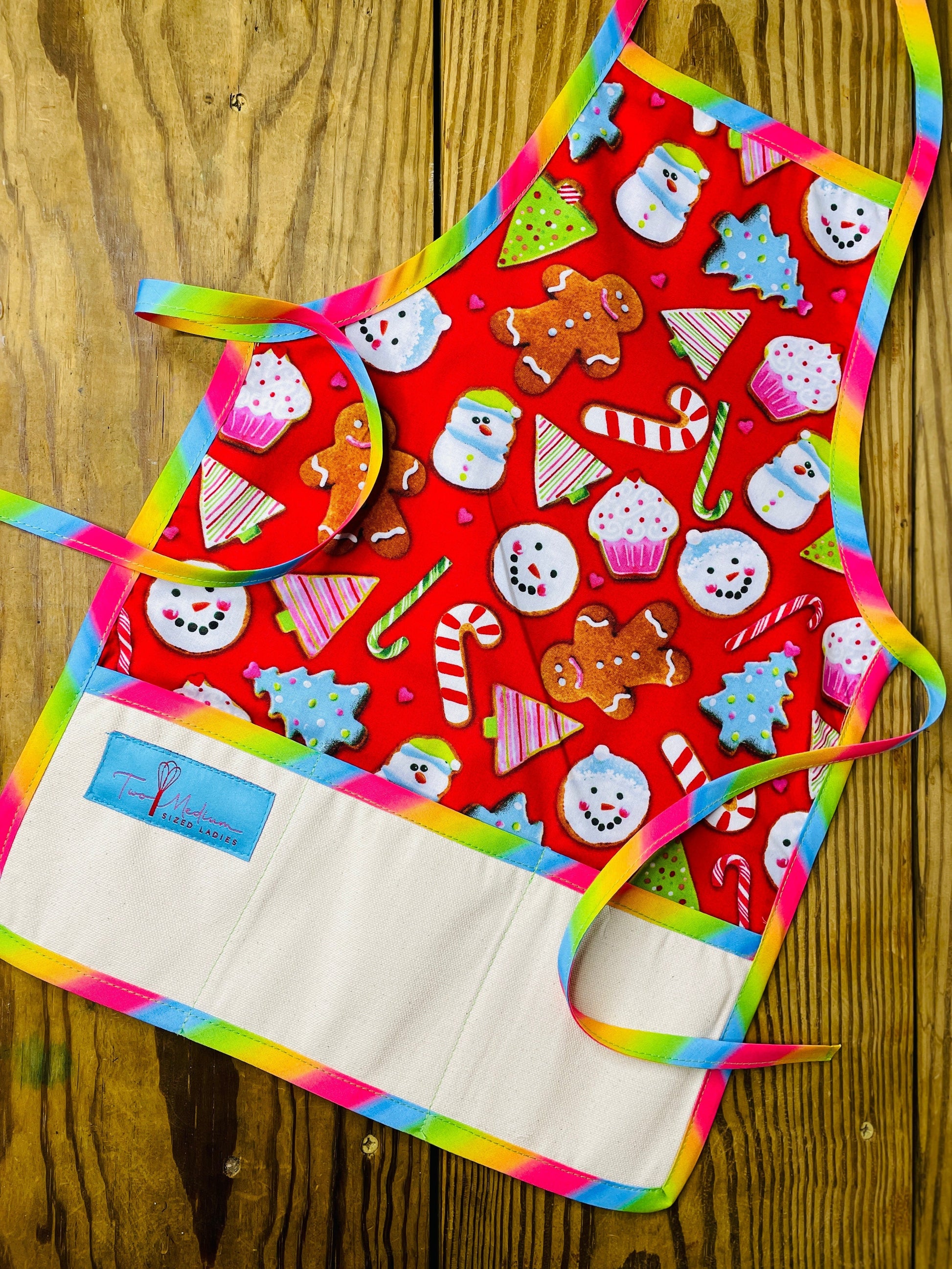 Two Medium Sized Ladies Gingerbread man cupcake snowman candy cane tree Christmas cookie sweet treats children's apron with rainbow trim and apron strings