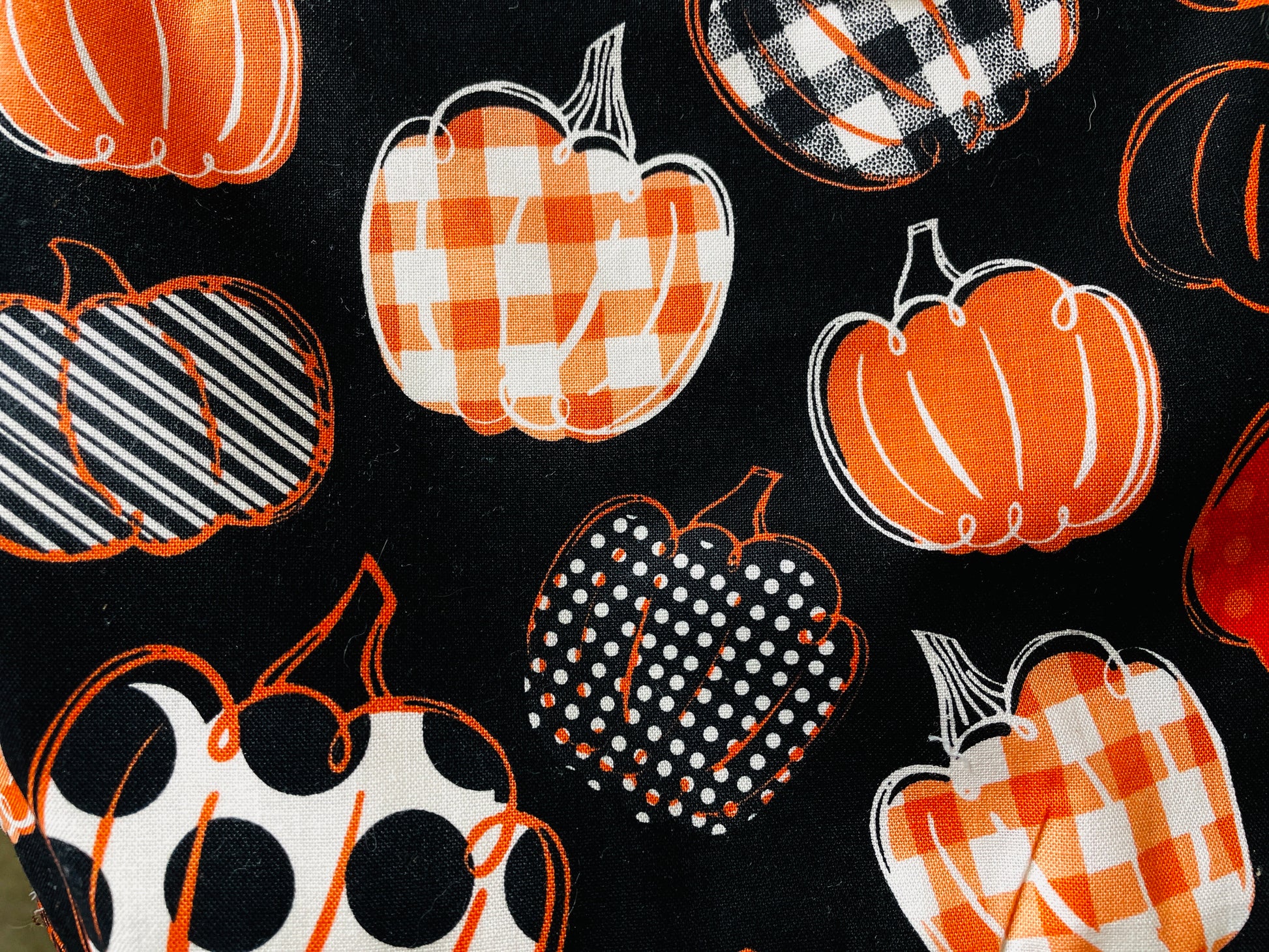 Two Medium Sized Ladies pumpkin spice everything black and orange halloween farmhouse style apron fabric pattern