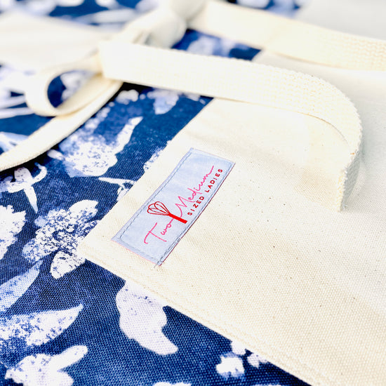 Two Medium Sized Ladies Tiffany Apron periwinkle purple blue field of flowers in relief blue jean look