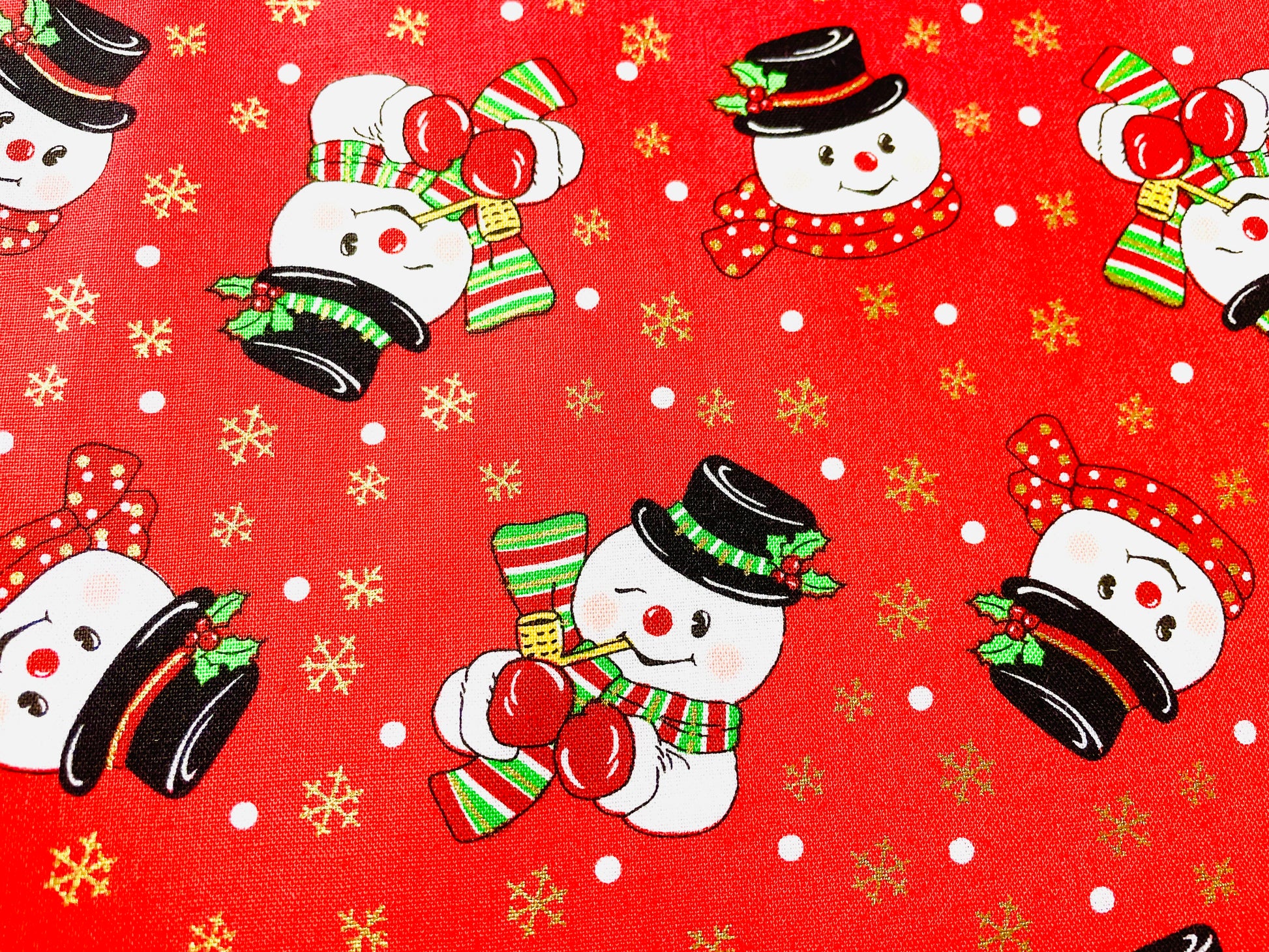 Two Medium Sized Ladies frosty the snowman apron quilting cotton winking snowman smiling with corn cob pipe button nose eyes made out of coal